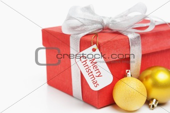 Red Christmas gift with tag