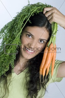 girl with carrots on her head