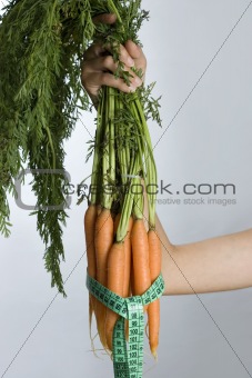 carrots with measuring tape