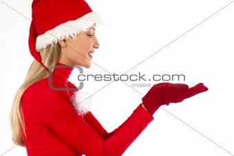 Beautiful Santa girl on white presenting/holding something with 