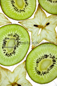 Sliced Kiwifruit and Starfruit isolated on white