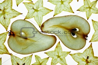Sliced Pear and Carambola Starfruit isolated on white