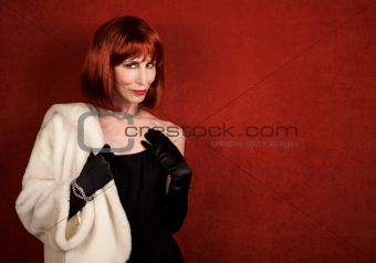 Socialite with brassy red hair