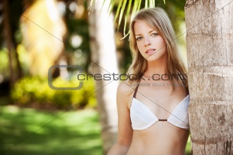 Attractive woman in palm park