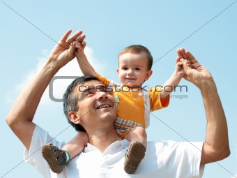 Father and his little son outdoor