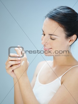 woman massaging hands