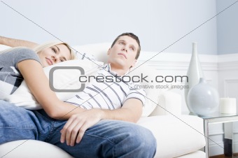 Couple Relaxing on Couch