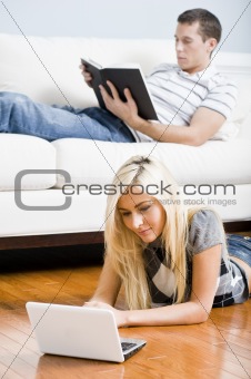 Couple Relaxing in Living Room