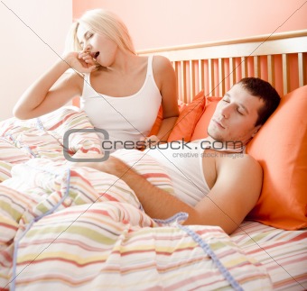 Sleepy Couple in Bed