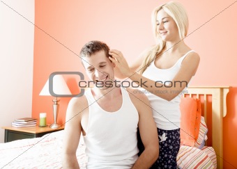 Affectionate Couple in Bedroom