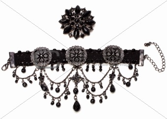 bracelet and brooch isolated on white background 
