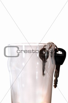 car keys in pint glass