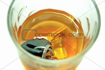 car keys in whiskey tumbler