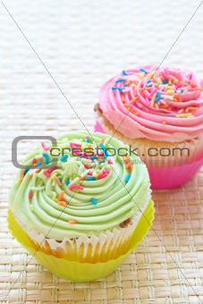 Vanilla cupcakes with strawberry and lime icing