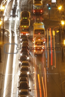 prague - high angle view of traffic on cechuv bridge at dusk