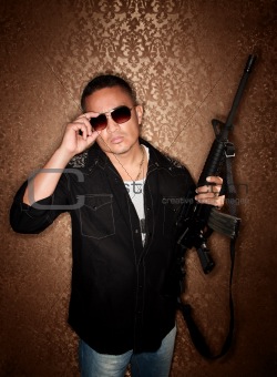 Hispanic Man with Rifle
