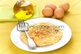 mushrooms olives and potatoes omelette