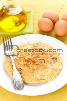 mushrooms olives and potatoes omelette
