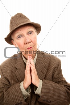 Senior woman in male clothes giving blessing
