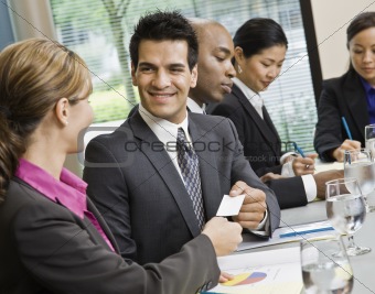 Businessman at Meeting Smiling