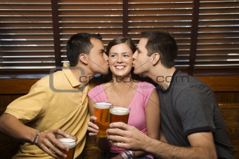Two Men Kissing Young Woman