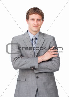 Confident businessman with folded arms 
