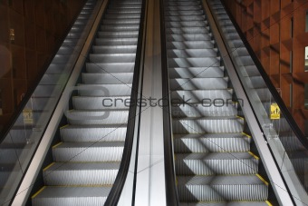 Ascending and descending escalators.