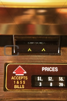 Close-up of money slot on jukebox.