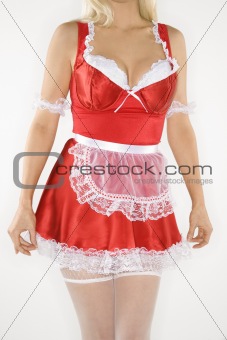 Young woman in french maid oufit.