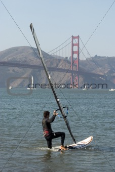 Windsurfer with Golden Gate boarding