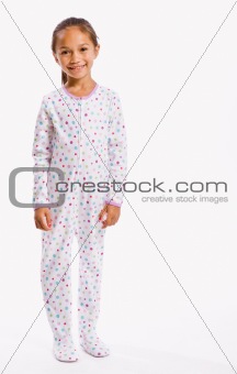 Girl in footie pajamas