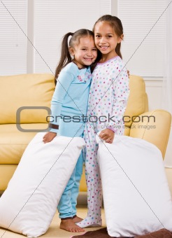 Girls in pajamas in livingroom