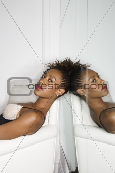 Attractive Young Woman Reclining in Chair 