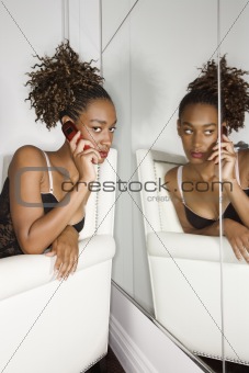 Attractive Young Woman Sitting in Chair 