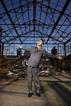 Young Businessman Smiling With Arms Open