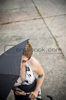hiding behind the umbrella