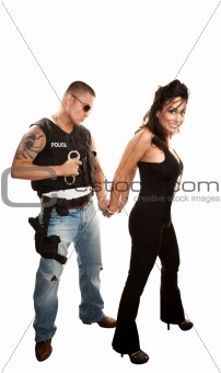 Hispanic cop arresting pretty woman