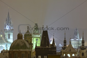 prague - spires of the old town during heavy snowfall