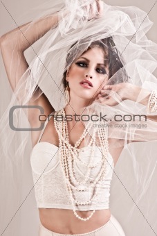 Attractive Young Woman Wearing a Veil