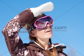 Young girl wearing ski mask 