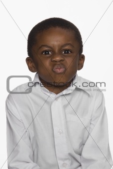 Portrait of Boy with Angry Expression. Isolated.