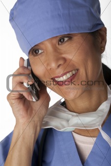 Medical Professional in Scrubs on the Phone