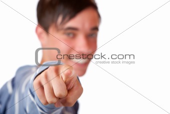 Male Teenager pointing with finger on you