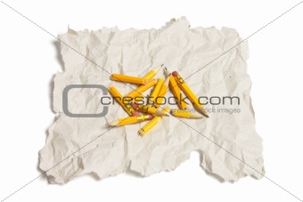 Broken Pencil Pieces and Waste Paper