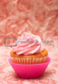 Vanilla cupcake with strawberry icing