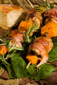 Quail with bacon