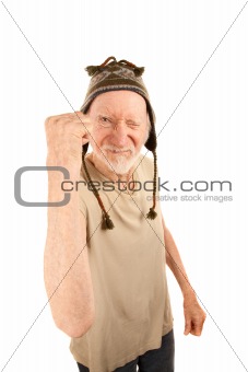 Senior man in knit cap shaking fist