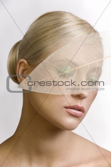 closed eyes portrait with leaf