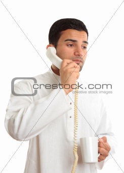 Businessman on phone with coffee
