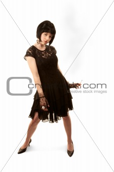 Retro woman with black hair and Parisian 1950s dress